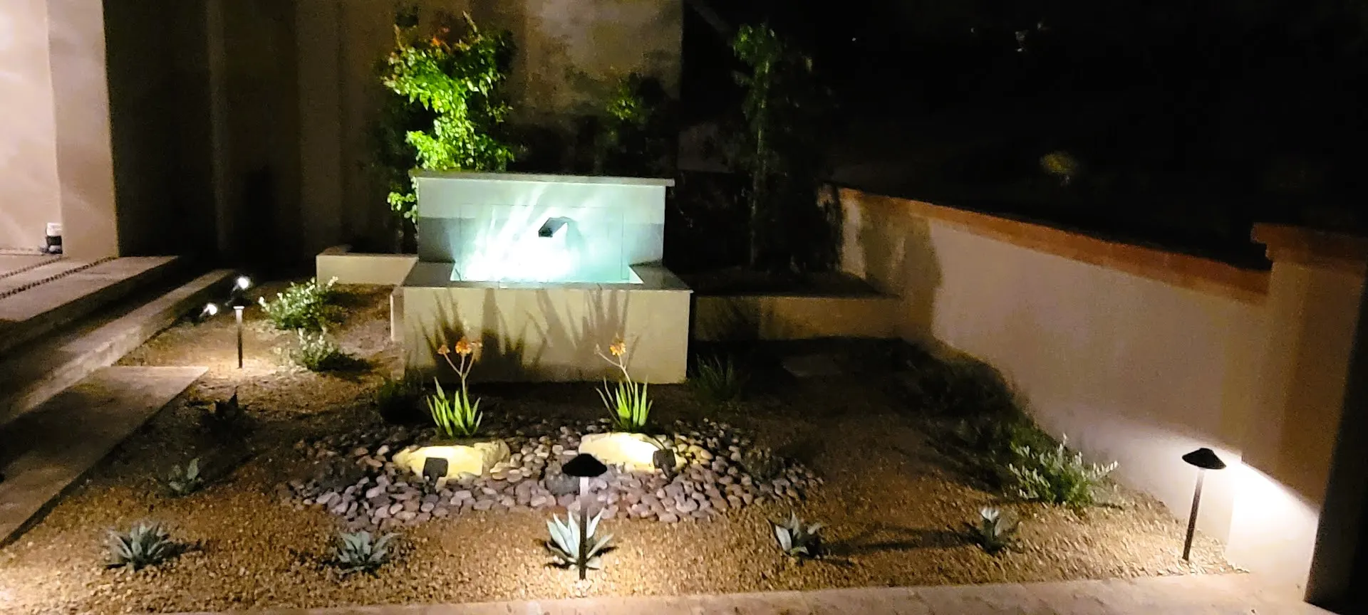 Finished landscape lighting at a Paradise Valley property after dark